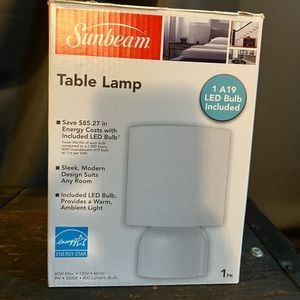 Sunbeam white desk lamp. Comes with energy saving bulb. Nwt